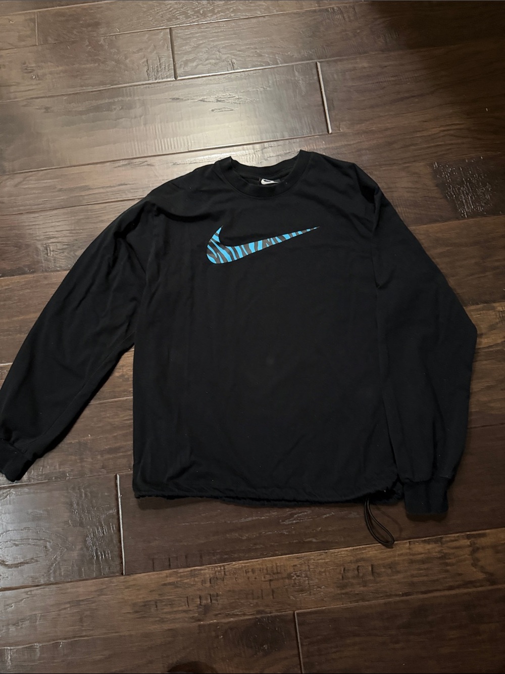 Nike Top Black Long-Sleeve Crewneck with Blue Zebra Swoosh